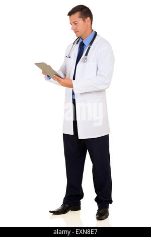 professional young doctor working on tablet computer Stock Photo