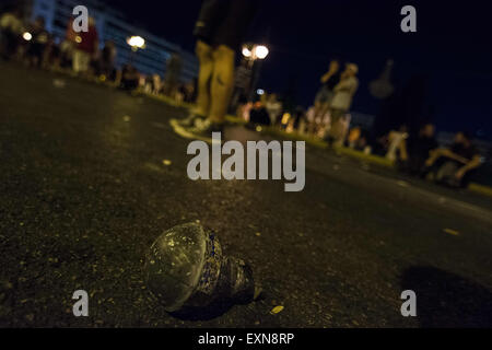 Athens, Greece. 15th July, 2015. Riot police use tear gas against protesters outside the Greek parliament. The recent agreement between Greece and it's creditors has sparked anger and controversy even among the governing parties as it seems not to take into account the bailout referendum result. Credit:  Nikolas Georgiou/ZUMA Wire/ZUMAPRESS.com/Alamy Live News Stock Photo