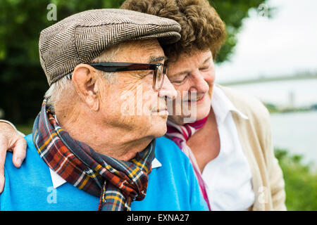 Profile of happy senior man head to head with his wife Stock Photo