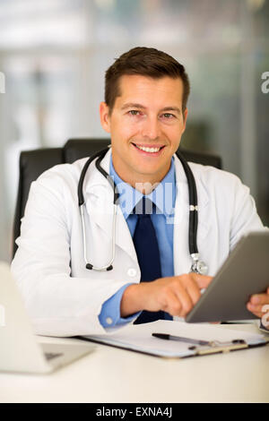 modern doctor using tablet computer in office Stock Photo