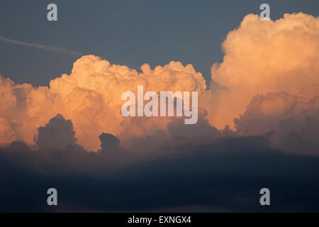 big clouds in the evening light Stock Photo