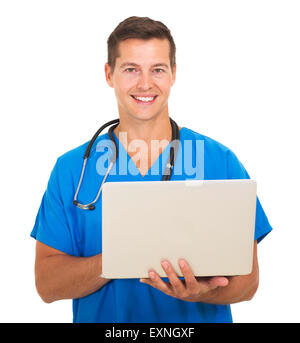 portrait of doctor working on laptop computer Stock Photo