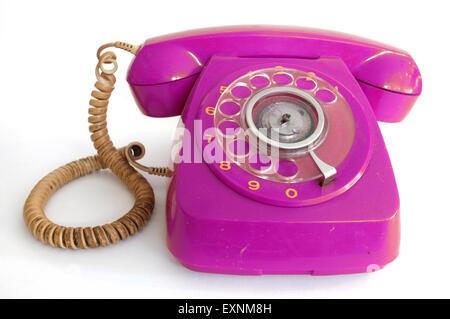 Pink red retro rotary dial telephone Stock Photo