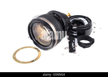 camera lens has been dropped and shattered on white background Stock Photo