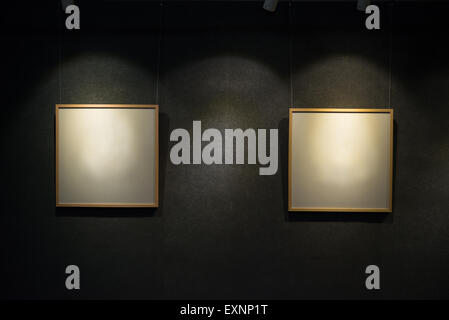 two blank display frames highlighted in a showroom Stock Photo