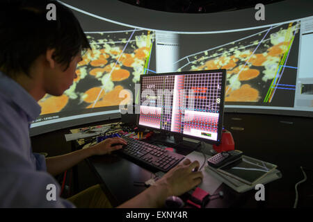 Sydney, AUSTRALIA - July 16, 2015: Technican Darren Lee pictured in the UTS: University of Technology Sydney’s new Data Arena on July 16, 2015 in Sydney, Australia.  The Data Arena is a 360-degree 3D interactive data visualisation facility where viewers stand in the middle of a large cylindrical screen, four metres high and ten metres in diameter. Credit:  MediaServicesAP/Alamy Live News Stock Photo