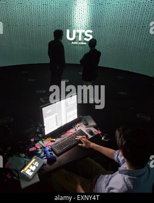 Sydney, AUSTRALIA - July 16, 2015: Technican Darren Lee pictured in the UTS: University of Technology Sydney’s new Data Arena on July 16, 2015 in Sydney, Australia.  The Data Arena is a 360-degree 3D interactive data visualisation facility where viewers stand in the middle of a large cylindrical screen, four metres high and ten metres in diameter. Credit:  MediaServicesAP/Alamy Live News Stock Photo
