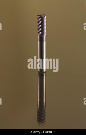 end mill six flutes carbide coated gray background Stock Photo