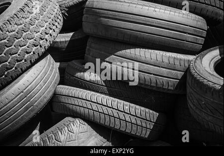 Heap of old used worn-out tires Stock Photo