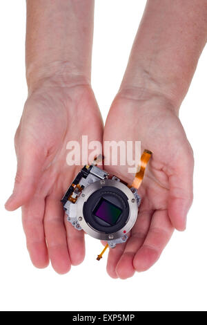 Modern hi-tech  image sensor  for a mass production  camera in worker  hands for you. Isolated on white. Stock Photo