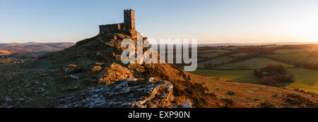 Brent Tor Church lit by the last rays of winter sunshine, Dartmoor, Devon. Stock Photo