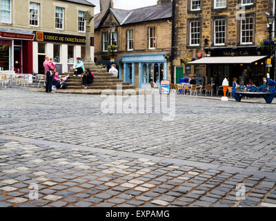 Cobbled Market Square and Market Cross in Alnwick Northumberland England Stock Photo
