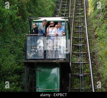 Lynton and Lynmouth cliff railway, Exmoor, Devon, UK. Passengers descending steep cliff by water powered transport. Stock Photo