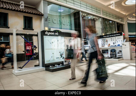 Dyson Roadshow Eldon Square Newcastle showing off and selling the new Dyson V6 vacuum cleaner that is as powerful as an upright Stock Photo