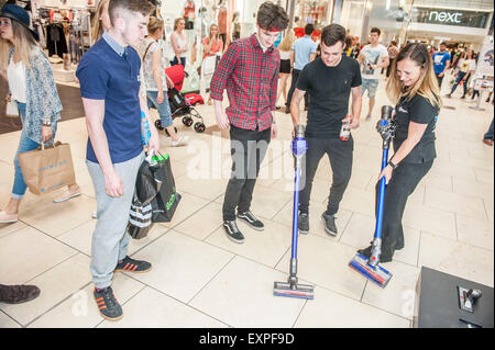 Dyson Roadshow Eldon Square Newcastle showing off and selling the new Dyson V6 vacuum cleaner that is as powerful as an upright Stock Photo