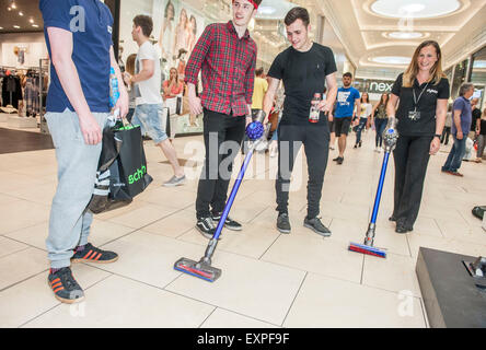 Dyson Roadshow Eldon Square Newcastle showing off and selling the new Dyson V6 vacuum cleaner that is as powerful as an upright Stock Photo