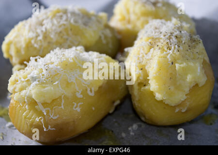 potatoes stuffed with pecorino cheese and gratinéed in oven Stock Photo