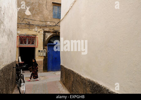 Girl walking in medina of Essaouira. Stock Photo