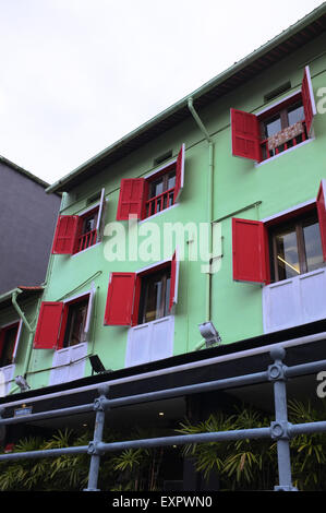 Vintage red window on green wall Stock Photo