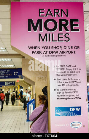 Dallas Texas,Dallas Ft. Fort Worth International Airport,DFW,American Airlines,terminal,sign,ad,DFW Customer Rewards program,miles,points,shopping sho Stock Photo