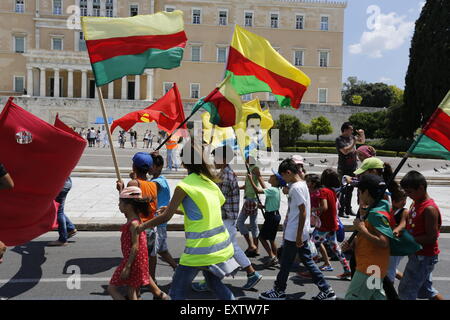 Athens, Greece. 16th July 2015. The leading group of children passes the Greek Parliament at the Abdullah Öcalan solidarity protest in Athens. Kurdish people living in `Greece, marched to the Turkish Embassy, calling for a release of the leader of the (Kurdistan Workers' Party) PKK, who is currently imprisoned in Turkey. Stock Photo