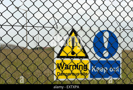 Warning Keep Out sign on the fence of a former RAF radar station