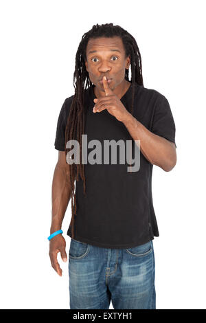 Handsome man with dreadlocks doing different expressions in different sets of clothes: be quiet Stock Photo