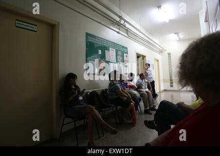 (150716) -- SAO PAULO, July 16, 2015 (Xinhua) -- Image taken on July 15, 2015 shows patients waiting to receive acupuncture treatment at a public health center of the Unified Health System (SUS), in Sao Paulo, Brazil. According to the Health Department of Sao Paulo, the acupuncture, a component of Chinese Traditional Medicine was introduced at public heath centers in the city in 2001. Following the recommendations of the World Health Organization (WHO), Brazil approved in 2006 the 'National Policy of Integrative and Complementary Practices' when the acupuncture and other 'Complementary Medicin Stock Photo