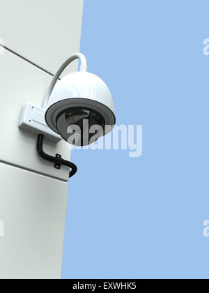 A security (CCTV) dome camera attached to the corner of a building Stock Photo