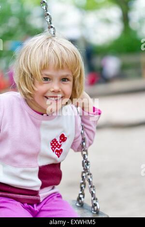 Female Blonde Swinging Long Hair Stock Photo - Alamy