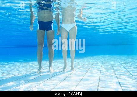 Couple standing in water in an open-air bath Stock Photo