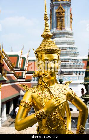 Golden Temple figure in Wat Phra Kaeo in Bangkok, Thailand Stock Photo