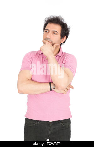 Handsome arabic man doing different expressions in different sets of clothes: thinking Stock Photo