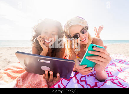 Female friends on beach Stock Photo