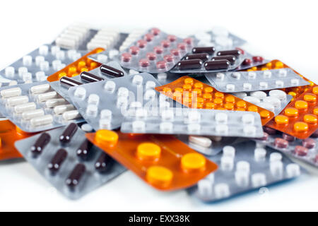 Pile of medication, tablets and capsules, blister packs Stock Photo