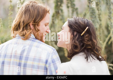 Smiling couple looking at each other Stock Photo