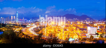 Panorama of cargo terminal and Hong Kong cityscape Stock Photo