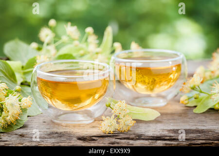 Two cups of healthy linden tea, herbal medicine. Stock Photo