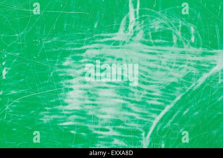 Grungy old scratched green color texture useful as background. Stock Photo