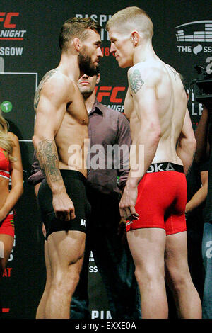 Glasgow, Scotland, UK. 17th July, 2015. Rob Whiteford (Glasgow, Scotland) and Paul Redmond (Dublin, Ireland) face off during the weigh in prior to UFC Fight Night 72: Bisping vs Leites at The SSE Hydro on Friday the 17 of July 2015. The SSE Hydro Arena. Credit:  Dan Cooke/Alamy Live News Stock Photo