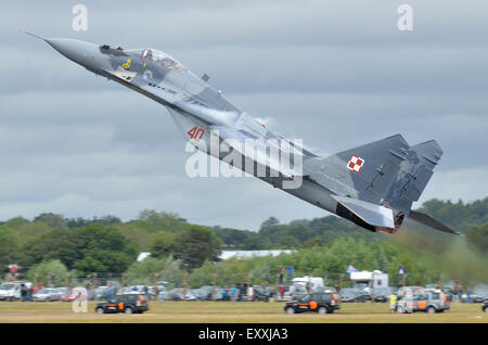 Mikoyan Gurevich Mig 29 operated by the Polish Air Force taking off in dramatic fashion during Friday's RIAT 2015. Credit:  Antony Nettle/Alamy Live News Stock Photo