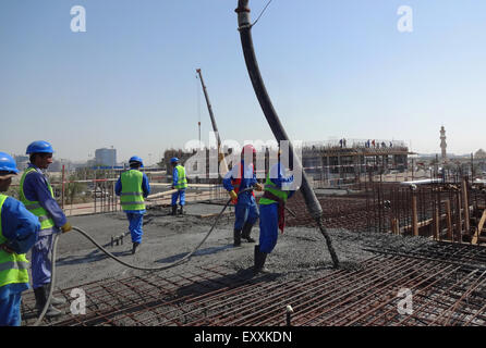 Casting Readymix Concrete for Slab using Concrete Pump and with a vibrator and poker shaft, Stock Photo
