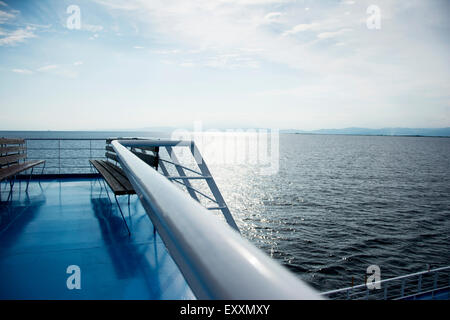 Metal fence on top of the ferry boat with sea view Stock Photo
