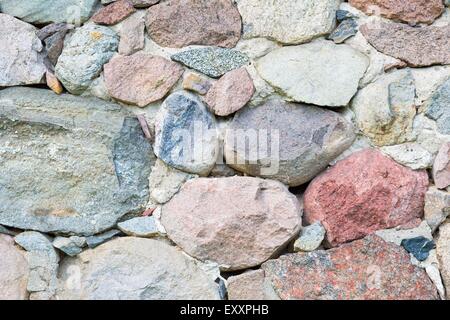 Beautiful close up of old stone wall - useful as background. Stock Photo