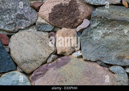 Beautiful close up of old stone wall - useful as background. Stock Photo