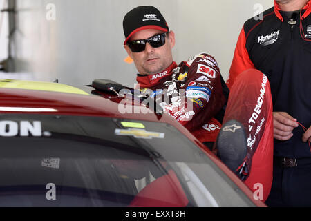 Loudon, New Hampshire, USA. 17th July, 2015. Sprint Cup Series driver Jeff Gordon (24) climbs into his car prior to a practice session at the 5-hour Energy 301 NASCAR Sprint Cup series race at the New Hampshire Motor Speedway. Eric Canha/CSM/Alamy Live News Stock Photo