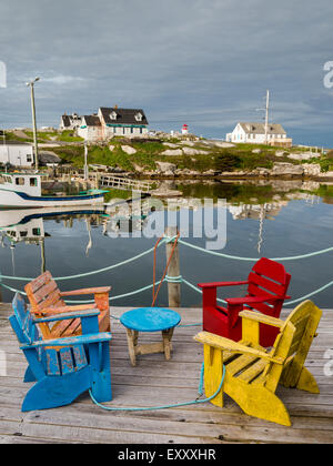 Colorful chairs on a dock at Peggy's Cove, Nova Scotia, Canada Stock Photo
