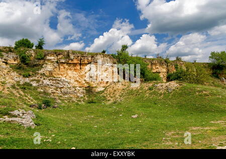General view toward sedimentary rock in the field, Ludogorie, Bulgaria Stock Photo