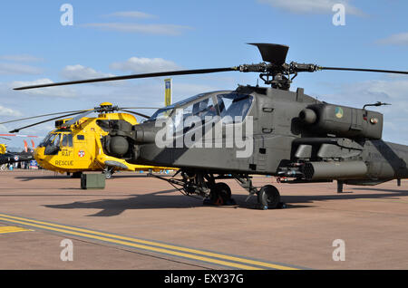 Royal Netherlands Air Force AH-64D Apache and RAF Sea King helicopters on display at RIAT 2015, Fairford, UK. Credit:  Antony Nettle/Alamy Live News Stock Photo