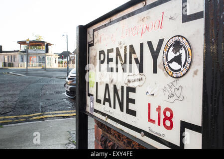 Liverpool, United Kingdom - October 12, 2014:  Sign for historic Penny Lane in Liverpool, United Kingdom with roundabout in the Stock Photo